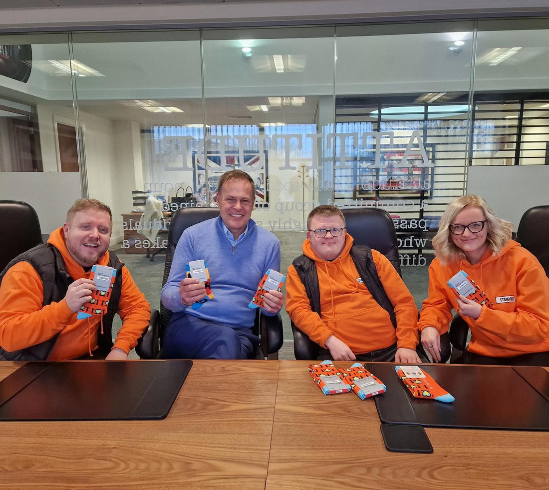 Peter Jones with the team of stand out socks