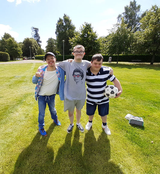 Jamie, Lewis, and Ryan Project Empowerment Stand Out Socks
