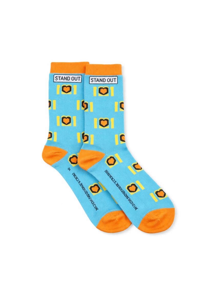 Blue socks with orange accents and a pattern on a white background