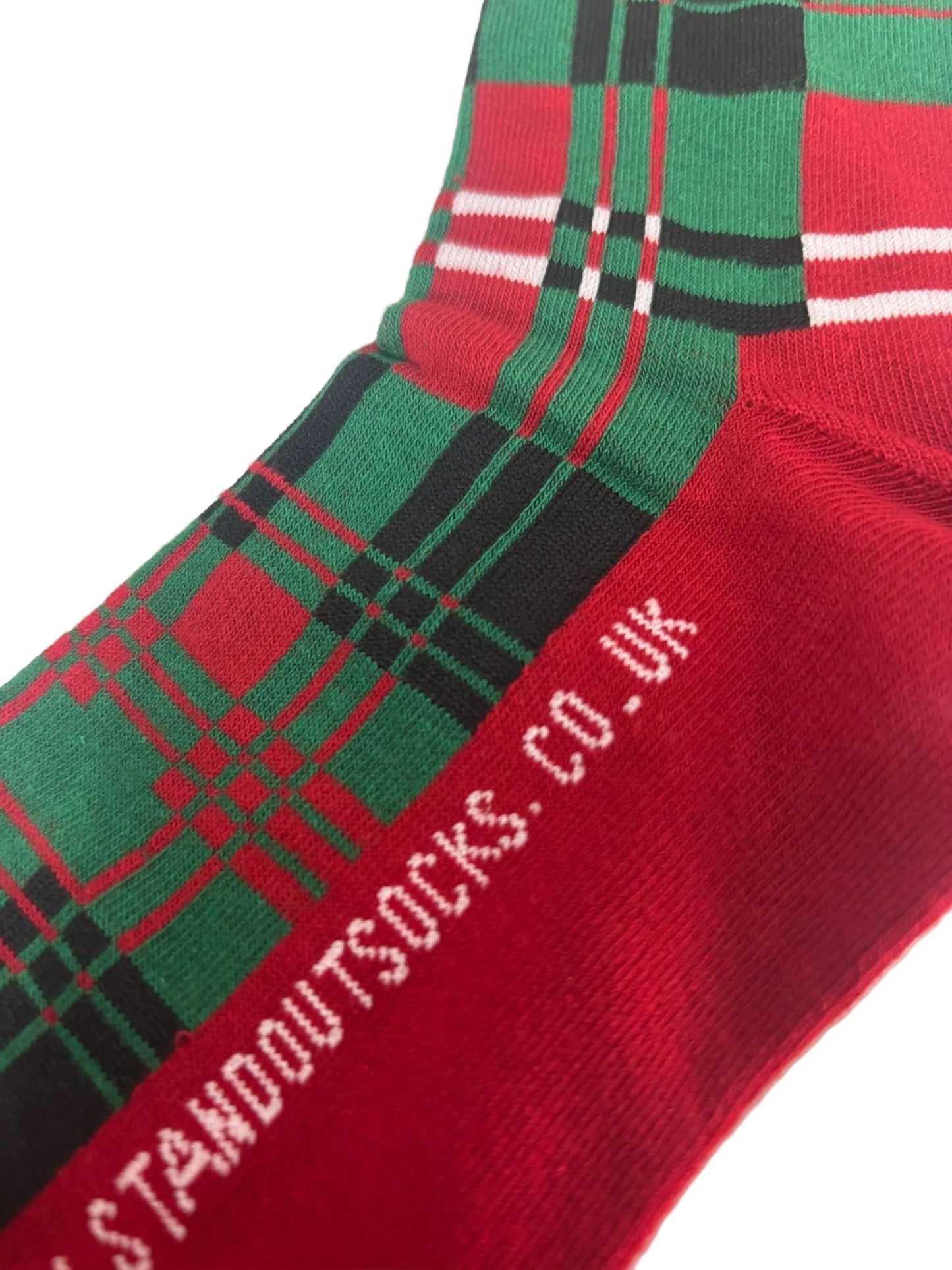 Red and green plaid sock with 'STANDOUTSOCKS.CO.UK' branding on a white background