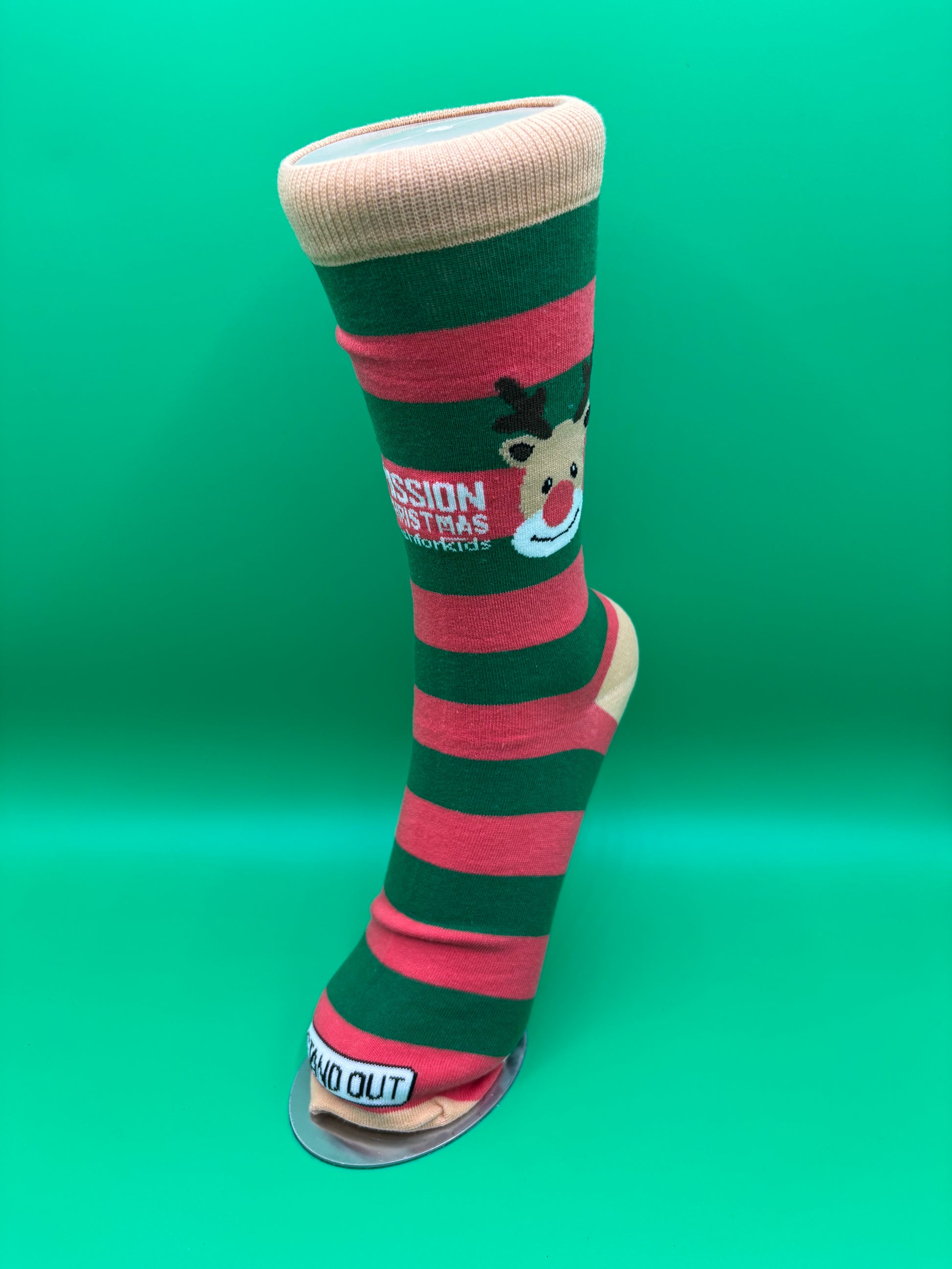 Green and red striped dog toy with brand logo on a green background