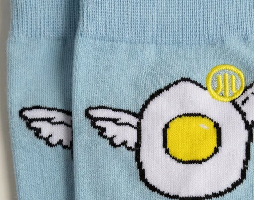 Close-up of the embroidered Stand Out Socks signature