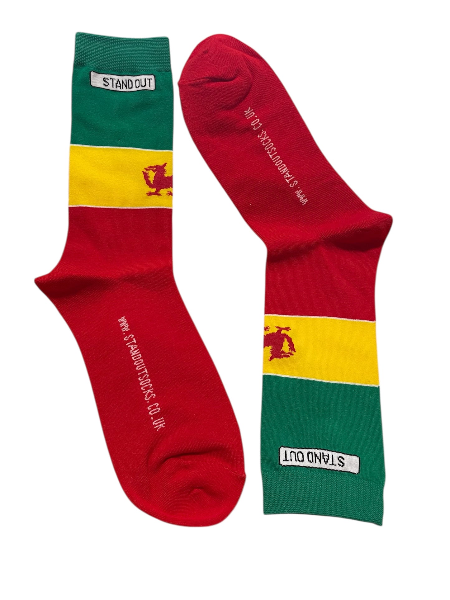 Two socks with a Welsh flag inspired design with Welsh Dragon on a white background.