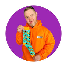 Load image into Gallery viewer, Oliver From Stand Out Socks Holding Manchester Bee Socks
