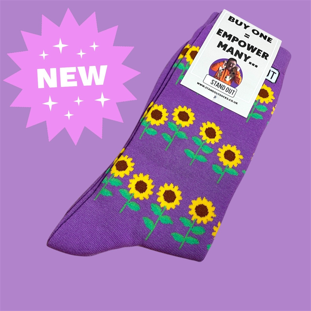 Purple socks with sunflower pattern on a purple background